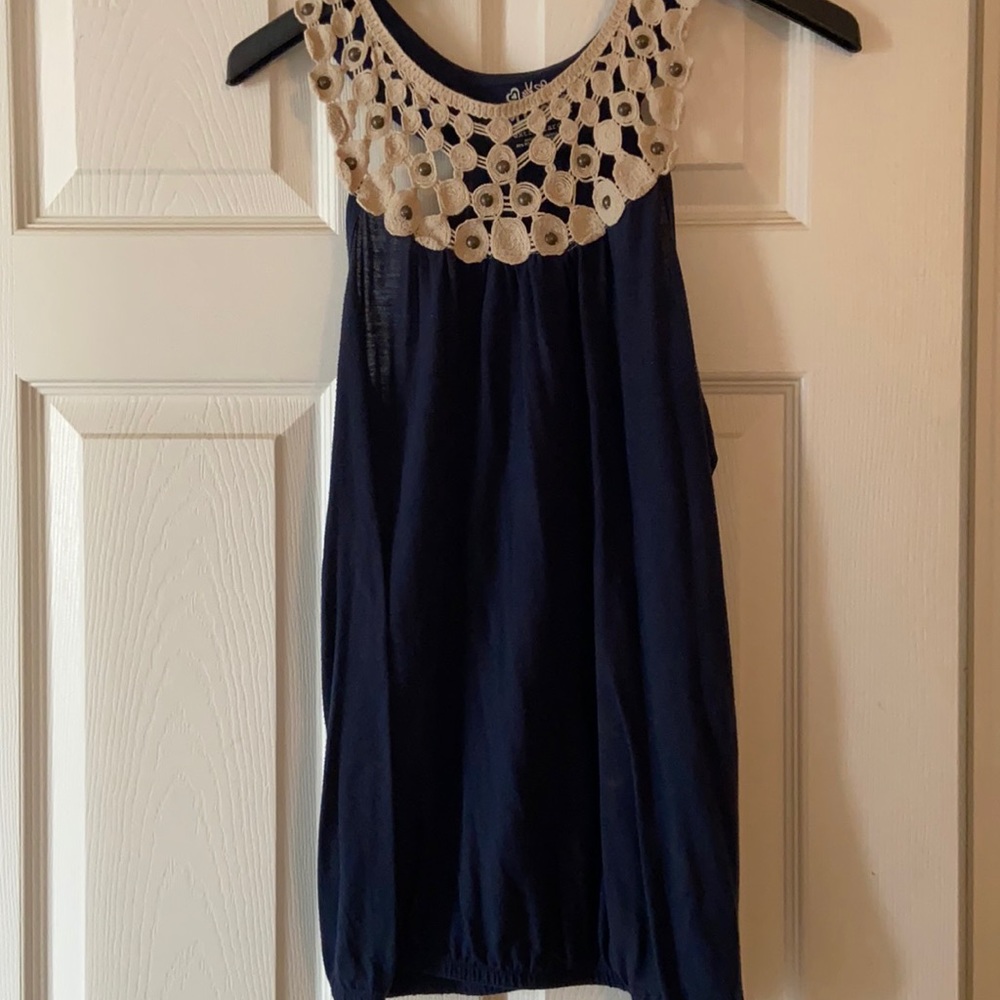 Navy blue tank with tan neckline